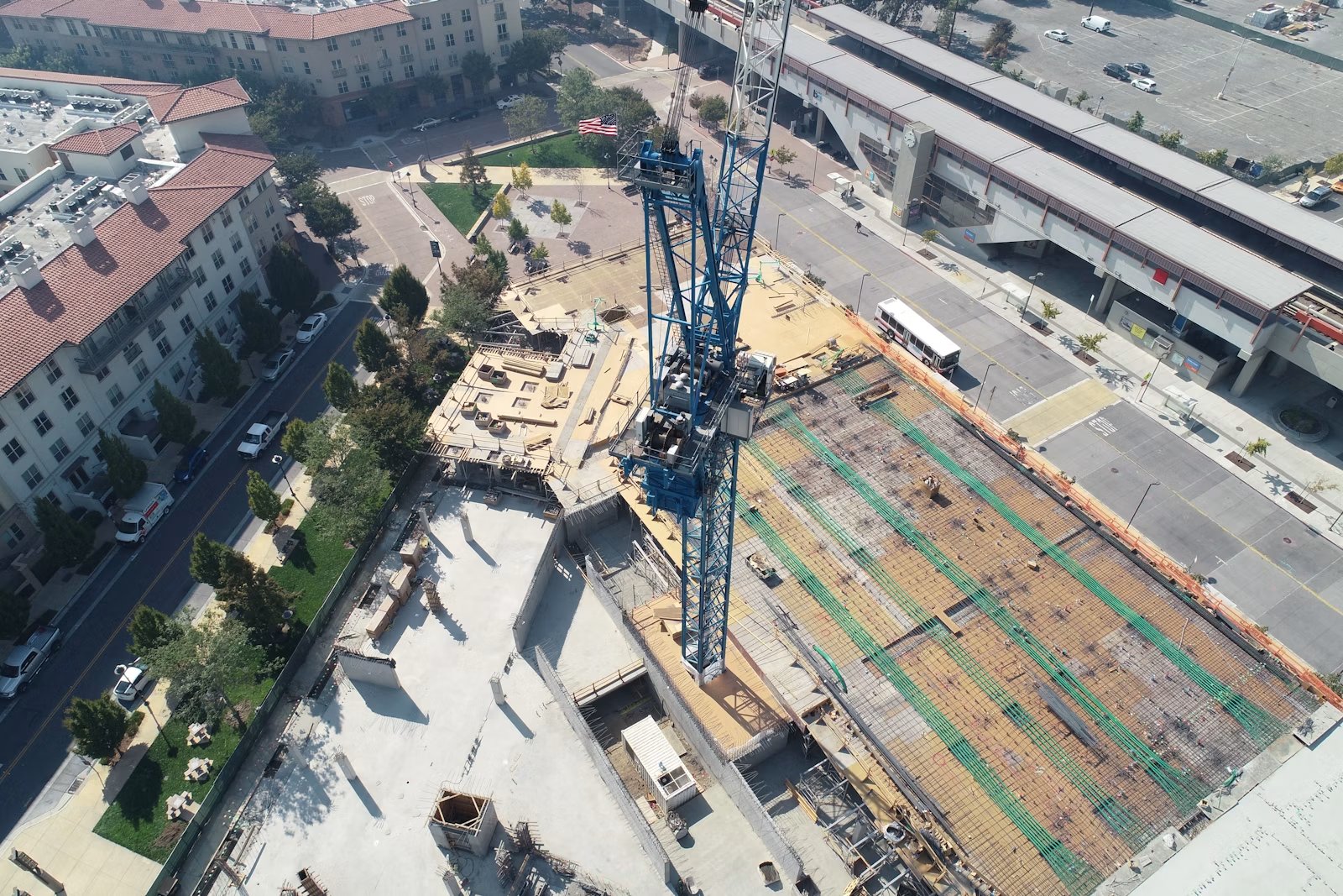 Tower crane between buildings under construction