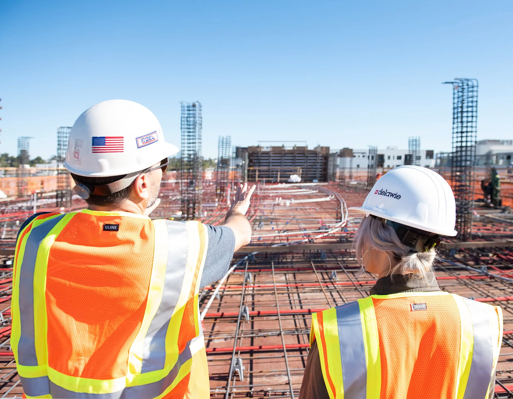 Workers in safety vests on site